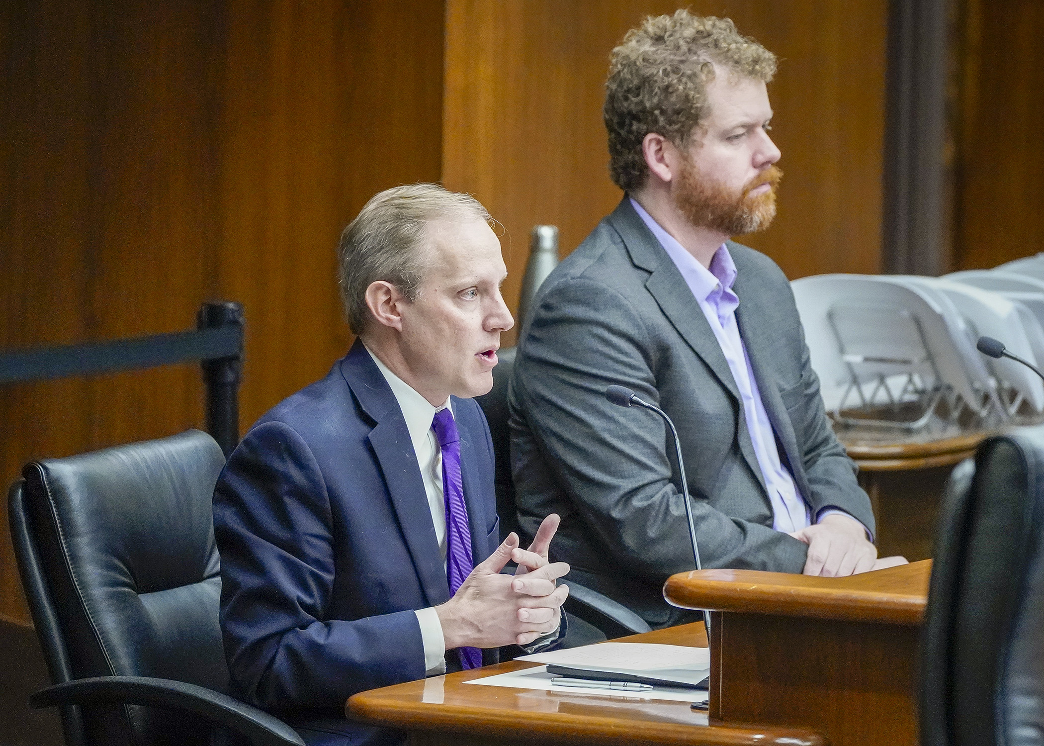 Secretary of State Steve Simon testifies before the House Elections Finance and Policy Committee Feb. 21 in support of a bill sponsored by Rep. Zack Stephenson, right, that would modify the law against using deepfake technology. (Photo by Andrew VonBank)